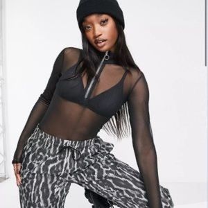 Nike Ivón clash mesh body suit in black
